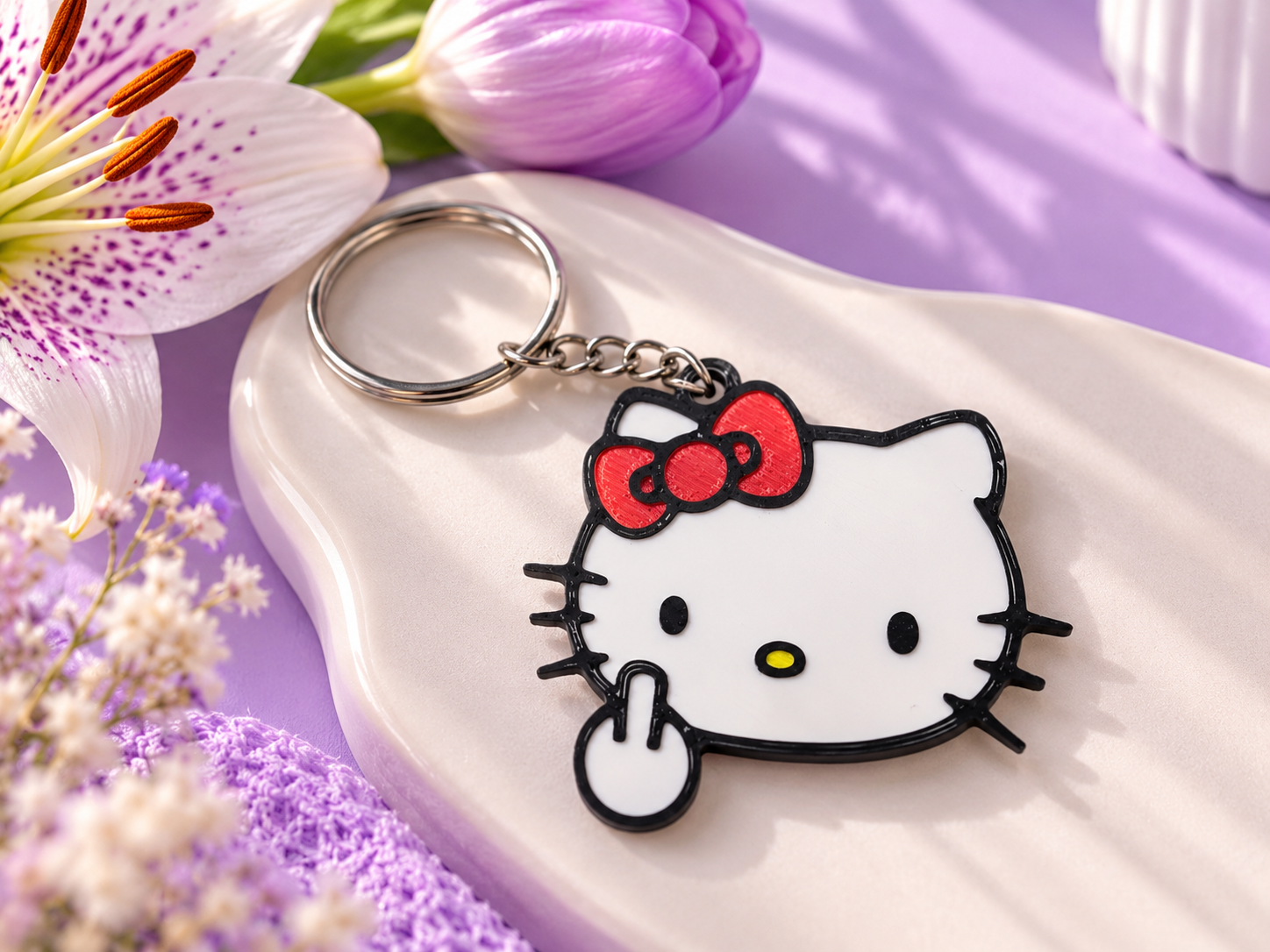 Chaveiro hello kitty - dedo do meio